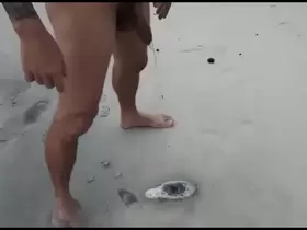 mature man dedicating his golden shower ON THE NUDE BEACH